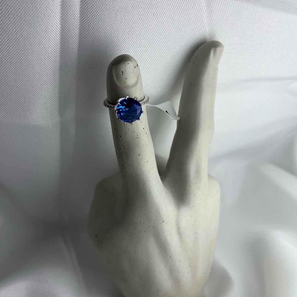 Sterling silver ring with blue stone